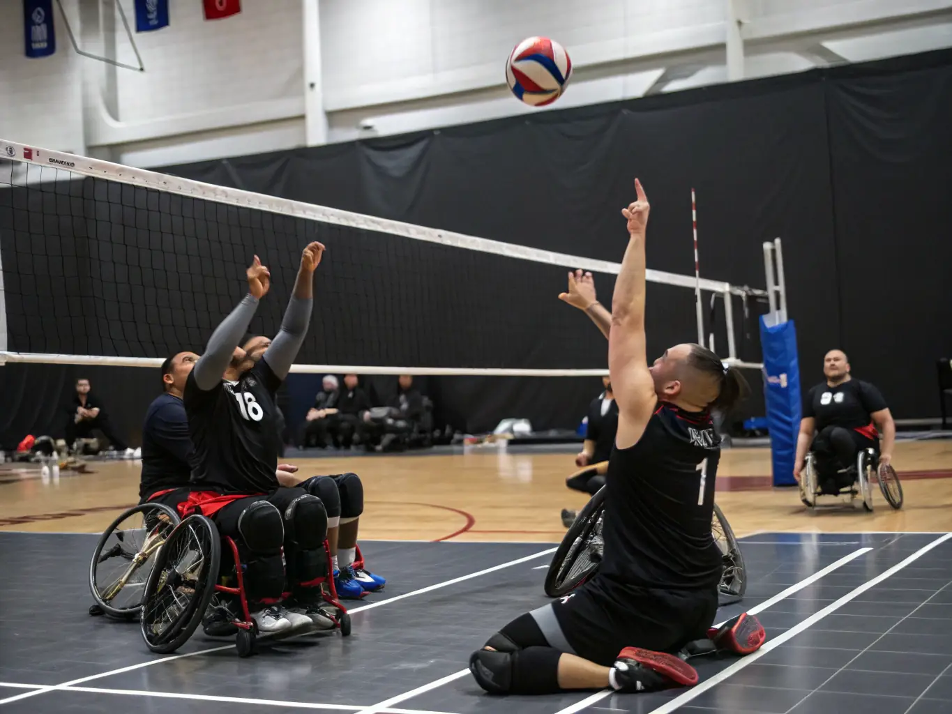A group of people with reduced mobility participating in a wheelchair basketball game, showcasing teamwork and sportsmanship.